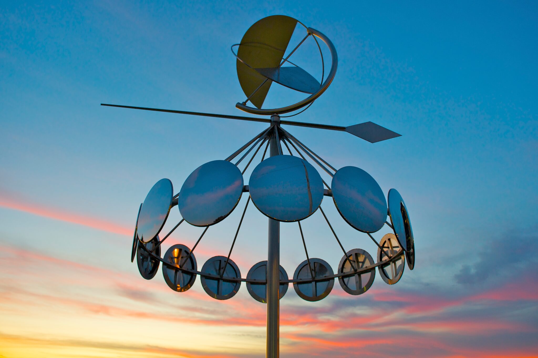 Mime is a public art sculpture by Kristin Jones and Andrew Ginzel located at the Richmond Heights MetroLink station. The artwork explores the intersecton of time and natural phenomena in a dynamic, visual experience.